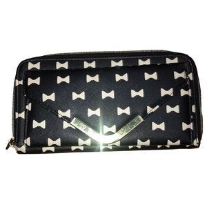 Black with white bows wallet outside snap compartment multi inside compartments